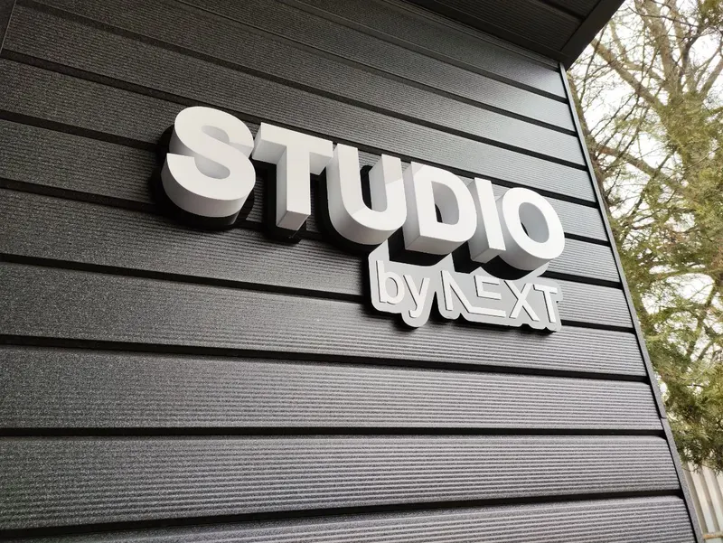 Объёмные буквы Studio by Next на фасаде — PixelMedia, Алматы