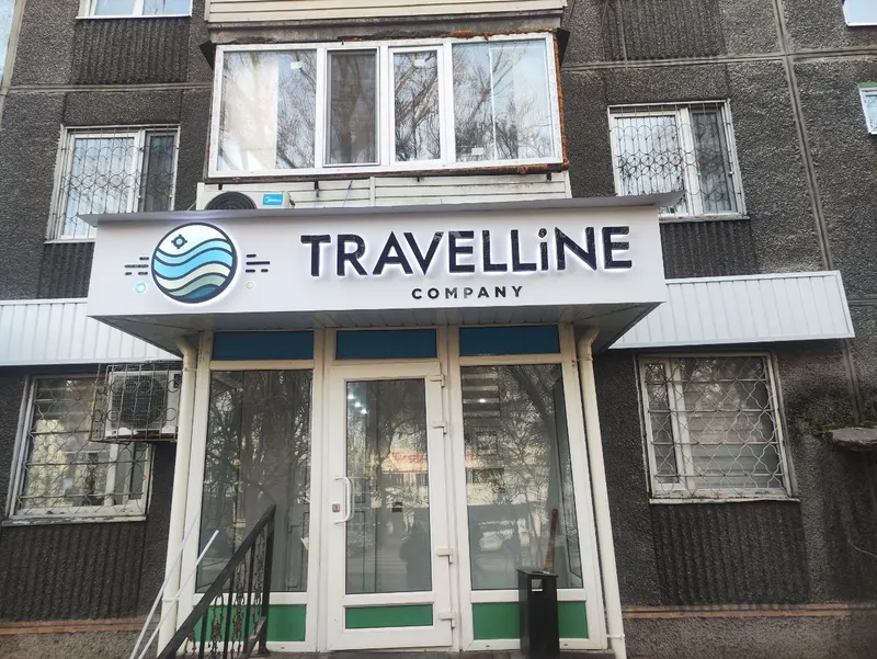 Фасад с вывеской Travelline Company — PixelMedia, Алматы